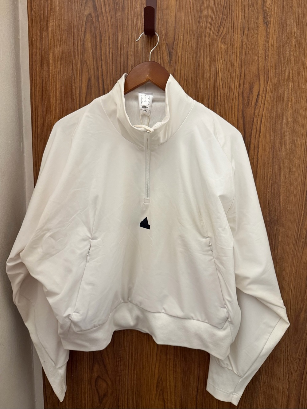 adidas White Quarter-Zip Track Top pullover with two front zipper pockets.